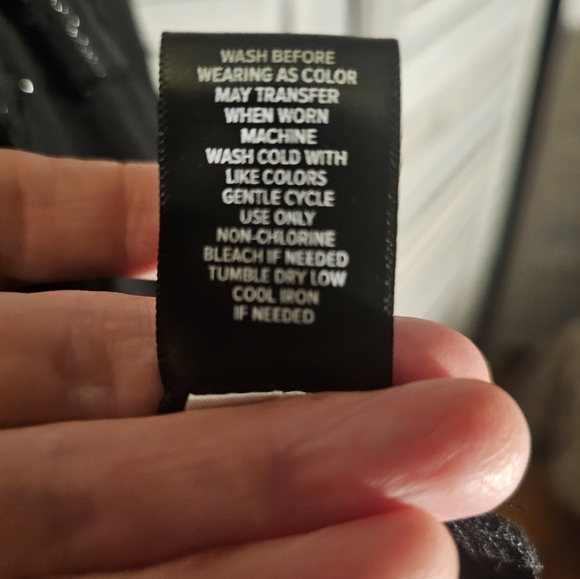 Torrid Black long wrap blouse with star print. - Picture 9 of 9